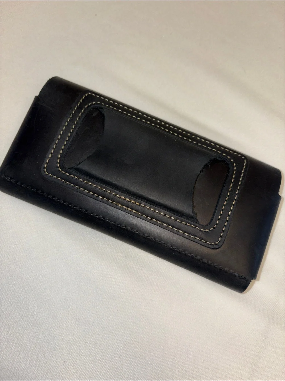Cellphone case made to fit on belt magnetic closure inside pocket for cards